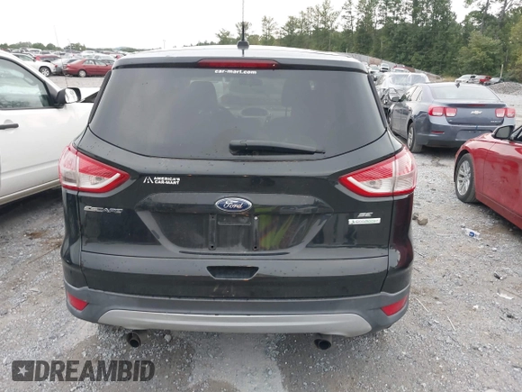 2014 Ford Escape SE with VIN 1FMCU0GX9EUB21853, listed as a IAAI auction lot 40313063 with 106,687 mi miles. Bid and sale history available at carsss.com. Image 16.