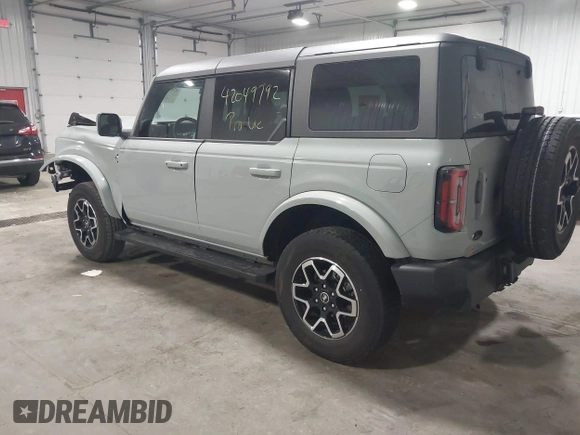 2023 Ford Bronco with VIN 1FMEE5BP7PLC09674, listed as a IAAI auction lot 42049792 with 25,937 mi miles and . Bid and sale history available at DreamBid. Image 3.