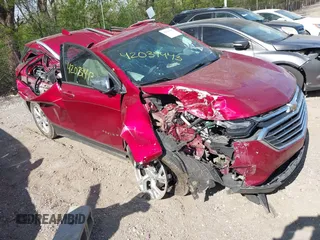 2021 Chevrolet Equinox Premier z VIN 2GNAXNEV7M6140889, wystawiony jako IAAI lot #42039443 z przebiegiem 101 767 mil mil oraz . Historia ofert i sprzedaży dostępna na DreamBid. Obrazek 1.