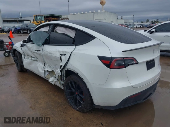 2022 Tesla Model Y Performance with VIN 7SAYGDEF1NF456829, listed as a IAAI auction lot 41448425 with 41,380 mi miles and . Bid and sale history available at DreamBid. Image 3.