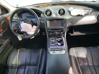2011 Jaguar XJ with VIN SAJXA2GE5BMV13122, listed as a Copart auction lot 73113044 with 164,196 mi miles and Salvage Title. Bid and sale history available at DreamBid. Image 8.