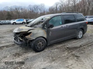 2015 Toyota Sienna XLE with VIN 5TDYK3DC4FS574285, listed as a Copart auction lot 49284185 with 0 mi miles and Salvage Title. Bid and sale history available at carsss.com. Image 1.