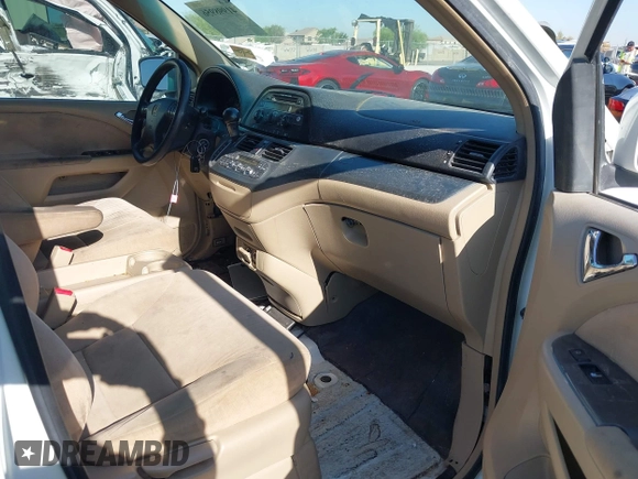 2005 Honda Odyssey EX with VIN 5FNRL38465B081716, listed as a IAAI auction lot 41998956 with 173,182 mi miles and . Bid and sale history available at carsss.com. Image 5.