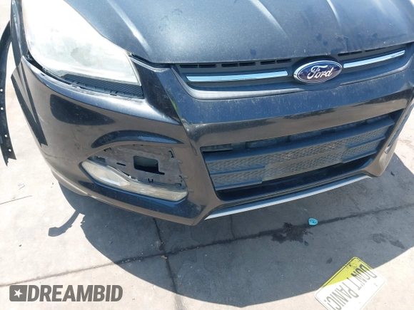 2014 Ford Escape SE z VIN 1FMCU0G96EUD57930, wystawiony jako IAAI lot #42347567 z przebiegiem 169 128 mil mil oraz . Historia ofert i sprzedaży dostępna na DreamBid. Obrazek 12.