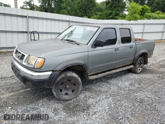 2000 Nissan Frontier XE with VIN 1N6ED27T2YC311037, listed as a Copart auction lot 57901285 with Not provided miles and Salvage title. Bid and sale history available at DreamBid. Image 1.