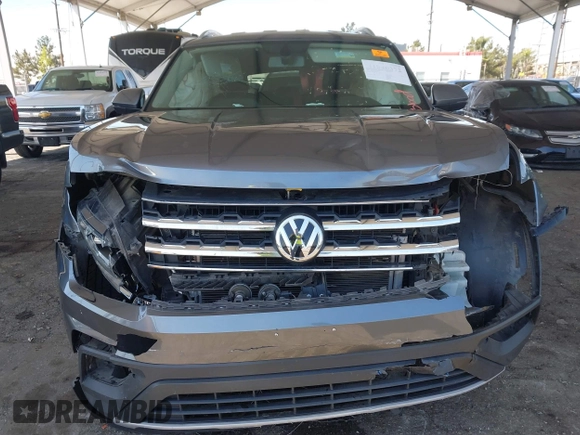 2019 Volkswagen Atlas SE with VIN 1V2DR2CA2KC547116, listed as a IAAI auction lot 41840372 with 102,625 mi miles and . Bid and sale history available at DreamBid. Image 6.