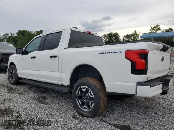 2023 Ford F-150 Lightning Pro z VIN 1FTVW1ELXPWG63466, wystawiony jako Copart lot #59163895 z przebiegiem Nie podano mil oraz Szkody całkowita. Historia ofert i sprzedaży dostępna na DreamBid. Obrazek 2.