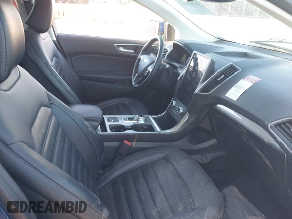 2024 Ford Edge SEL z VIN 2FMPK4J93RBA31974, wystawiony jako IAAI lot #41313322 z przebiegiem 20 436 mil mil oraz . Historia ofert i sprzedaży dostępna na DreamBid. Obrazek 5.