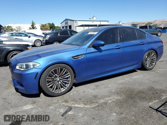 2016 BMW M5 with VIN WBSFV9C57GG343387, listed as a Copart auction lot 73416564 with 71,131 mi miles and Salvage Title. Bid and sale history available at carsss.com. Image 1.