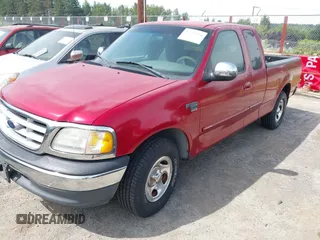1999 Ford F-150 XL with VIN 2FTRX17L1XCA78024, listed as a IAAI auction lot 42772314 with 95,663 mi miles and . Bid and sale history available at DreamBid. Image 2.