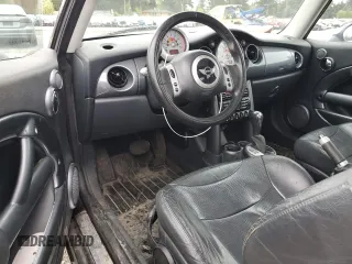 2004 MINI Hardtop with VIN WMWRC33464TJ54261, listed as a Copart auction lot 55150205 with 212,636 mi miles and Salvage Title. Bid and sale history available at DreamBid. Image 8.