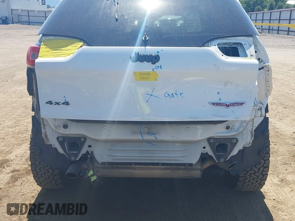 2014 Jeep Cherokee Trailhawk with VIN 1C4PJMBSXEW236807, listed as a IAAI auction lot 42660980 with 157,225 mi miles and . Bid and sale history available at DreamBid. Image 6.