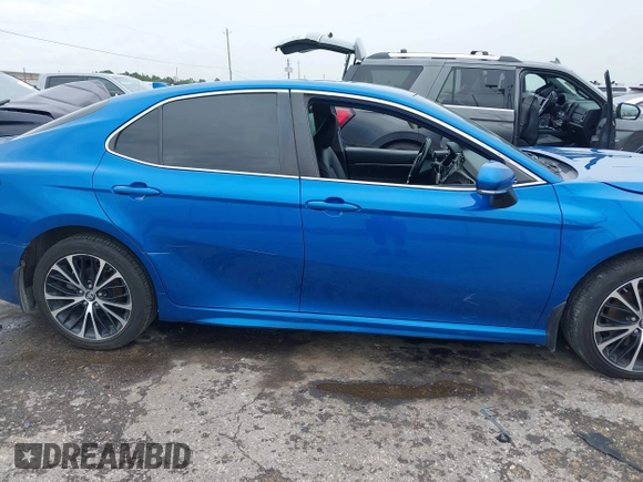 2019 Toyota Camry LE z VIN 4T1B11HK6KU217769, wystawiony jako IAAI lot #41900518 z przebiegiem 104 604 mil mil oraz . Historia ofert i sprzedaży dostępna na DreamBid. Obrazek 13.
