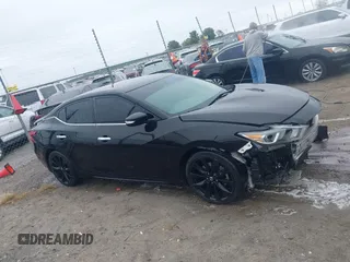 2017 Nissan Maxima SV with VIN 1N4AA6AP1HC445508, listed as a IAAI auction lot 40811202 with 105,072 mi miles and . Bid and sale history available at DreamBid. Image 13.