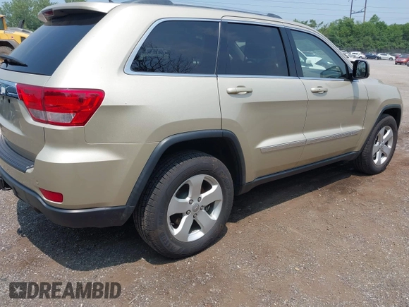 2011 Jeep Grand Cherokee Laredo with VIN 1J4RR4GG0BC713919, listed as a IAAI auction lot 42425229 with 139,379 mi miles and . Bid and sale history available at DreamBid. Image 4.