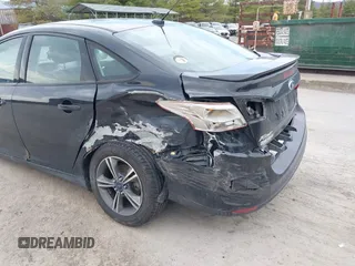 2014 Ford Focus SE with VIN 1FADP3F2XEL284465, listed as a IAAI auction lot 41903937 with 173,770 mi miles. Bid and sale history available at carsss.com. Image 6.