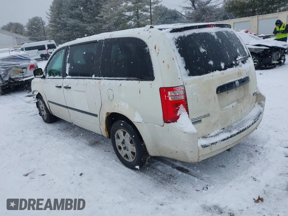 2009 Dodge Grand Caravan with VIN 2D8HN11E19R703857, listed as a IAAI auction lot 41195565 with 199,776 mi miles and . Bid and sale history available at DreamBid. Image 3.