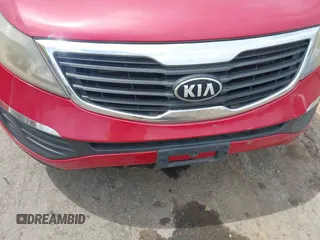 2013 Kia Sportage LX z VIN KNDPB3A20D7380934, wystawiony jako IAAI lot #42764553 z przebiegiem 203 688 mil mil oraz . Historia ofert i sprzedaży dostępna na DreamBid. Obrazek 6.