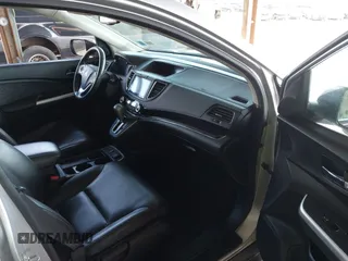 2015 Honda CR-V EX-L with VIN 2HKRM4H72FH616198, listed as a IAAI auction lot 42038752 with 82,826 mi miles and . Bid and sale history available at carsss.com. Image 5.