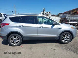 2016 Ford Escape Titanium with VIN 1FMCU9JXXGUA51537, listed as a IAAI auction lot 42118922 with 109,439 mi miles. Bid and sale history available at carsss.com. Image 13.