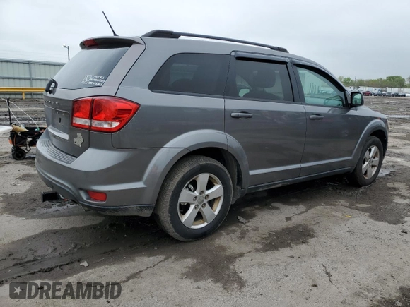 2012 Dodge Journey SXT z VIN 3C4PDDBG7CT183148, wystawiony jako Copart lot #55614685 z przebiegiem 182 263 mil mil oraz Szkoda całkowita • Salvage title. Historia ofert i sprzedaży dostępna na DreamBid. Obrazek 3.