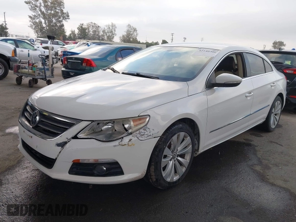 2009 Volkswagen CC Sport with VIN WVWML73C79E566020, listed as a IAAI auction lot 42140306 with 133,411 mi miles. Bid and sale history available at carsss.com. Image 2.