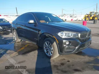 2019 BMW X6 sDrive35i with VIN 5UXKU0C57K0S97581, listed as a IAAI auction lot 41322568 with 76,635 mi miles. Bid and sale history available at carsss.com. Image 1.