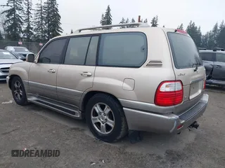 1999 Lexus LX 470 z VIN JT6HT00W4X0056023, wystawiony jako IAAI lot #41319329 z przebiegiem 206 974 mil mil oraz . Historia ofert i sprzedaży dostępna na DreamBid. Obrazek 3.