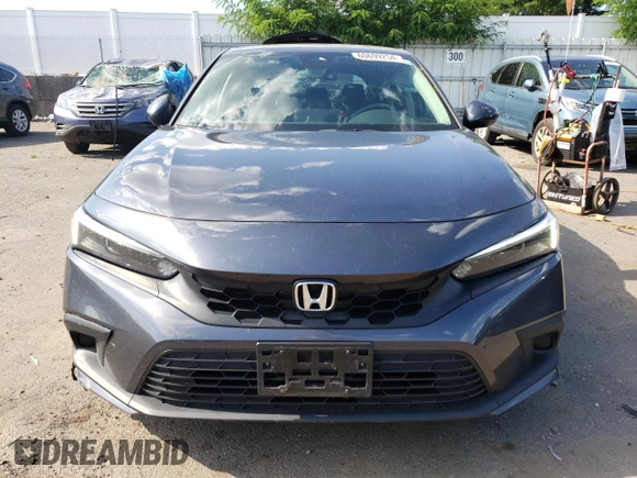 2022 Honda Civic LX z VIN 19XFL2H52NE000724, wystawiony jako Copart lot #60699254 z przebiegiem 63 830 mil mil oraz Szkoda całkowita • Salvage title. Historia ofert i sprzedaży dostępna na DreamBid. Obrazek 5.