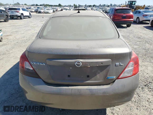 2012 Nissan Versa SV with VIN 3N1CN7AP1CL812288, listed as a Copart auction lot 63996355 with 128,229 mi miles and Clean title. Bid and sale history available at DreamBid. Image 6.