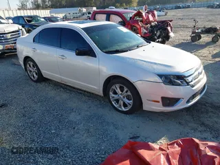 2012 Ford Fusion SE with VIN 3FAHP0HAXCR179699, listed as a IAAI auction lot 41009969 with 167,120 mi miles. Bid and sale history available at carsss.com. Image 1.