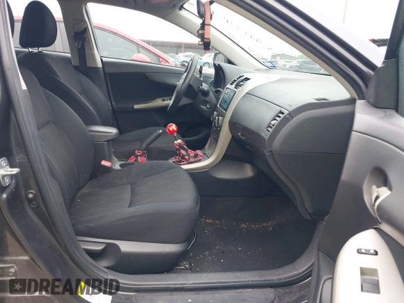 2011 Toyota Corolla L with VIN 2T1BU4EE6BC694212, listed as a IAAI auction lot 42130957 with 152,365 mi miles. Bid and sale history available at carsss.com. Image 5.