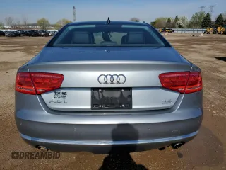 2012 Audi A8 with VIN WAURVAFD8CN018131, listed as a Copart auction lot 54260395 with 98,706 mi miles and Salvage title. Bid and sale history available at DreamBid. Image 6.