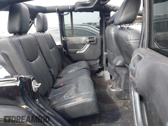 2015 Jeep Wrangler Unlimited Rubicon z VIN 1C4BJWFG7FL711036, wystawiony jako IAAI lot #41604648 z przebiegiem 167 678 mil mil oraz . Historia ofert i sprzedaży dostępna na DreamBid. Obrazek 8.