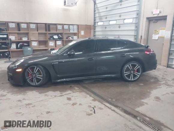 2014 Porsche Panamera GTS with VIN WP0AF2A73EL083133, listed as a IAAI auction lot 41945656 with 75,701 mi miles and . Bid and sale history available at DreamBid. Image 14.