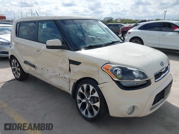 2012 Kia Soul + with VIN KNDJT2A63C7462882, listed as a IAAI auction lot 41162839 with 102,904 mi miles. Bid and sale history available at carsss.com. Image 1.