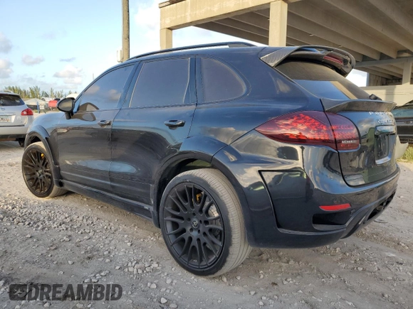 2014 Porsche Cayenne Turbo with VIN WP1AC2A22ELA87606, listed as a Copart auction lot 79227904 with 70,735 mi miles and Clean title. Bid and sale history available at DreamBid. Image 2.