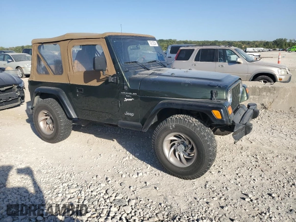 1998 Jeep Wrangler Sport with VIN 1J4FY19S0WP709843, listed as a Copart auction lot 74312254 with 147,010 mi miles and Salvage Title. Bid and sale history available at carsss.com. Image 4.