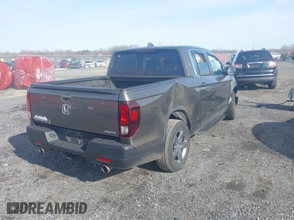 2022 Honda Ridgeline RTL z VIN 5FPYK3F51NB038239, wystawiony jako IAAI lot #41937070 z przebiegiem 39 012 mil mil oraz . Historia ofert i sprzedaży dostępna na DreamBid. Obrazek 4.