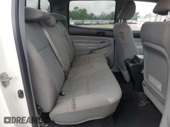 2013 Toyota Tacoma z VIN 5TFMU4FN1DX016379, wystawiony jako Copart lot #57460865 z przebiegiem 174 821 mil mil oraz Szkoda całkowita • Salvage title. Historia ofert i sprzedaży dostępna na DreamBid. Obrazek 10.