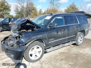 2019 Chevrolet Tahoe LT with VIN 1GNSKBKC9KR336743, listed as a IAAI auction lot 41445798 with 92,274 mi miles. Bid and sale history available at carsss.com. Image 2.