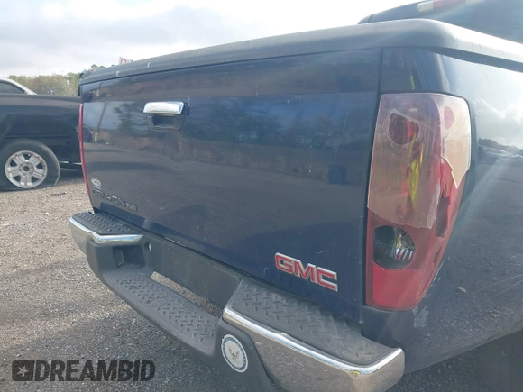 2009 GMC Canyon SLE1 with VIN 1GTCS139298121036, listed as a IAAI auction lot 41953007 with 230,957 mi miles. Bid and sale history available at carsss.com. Image 12.