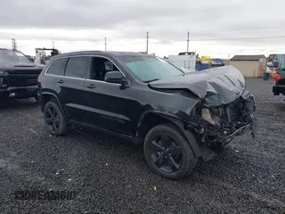 2015 Jeep Grand Cherokee Laredo with VIN 1C4RJFAG0FC154458, listed as a IAAI auction lot 41209018 with 269,929 mi miles. Bid and sale history available at carsss.com. Image 1.