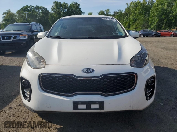 2018 Kia Sportage LX z VIN KNDPMCAC7J7448175, wystawiony jako Copart lot #59800765 z przebiegiem 138 825 mil mil oraz Czysty tytuł • Clean title. Historia ofert i sprzedaży dostępna na DreamBid. Obrazek 5.