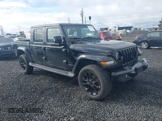 2023 Jeep Gladiator High Altitude z VIN 1C6HJTFG0PL504618, wystawiony jako IAAI lot #41877983 z przebiegiem 26 402 mil mil oraz . Historia ofert i sprzedaży dostępna na DreamBid. Obrazek 1.