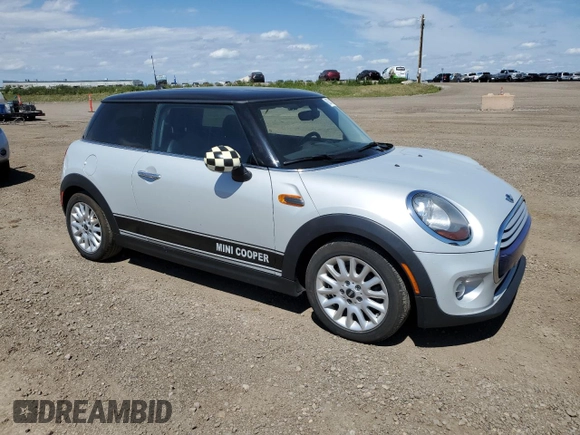 2015 MINI Hardtop with VIN WMWXM5C51F3A04184, listed as a Copart auction lot 63742035 with 150,029 mi miles and Salvage title. Bid and sale history available at DreamBid. Image 4.