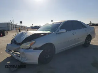 2004 Toyota Camry LE with VIN 4T1BE32K24U265992, listed as a Copart auction lot 53761975 with 97,006 mi miles and Salvage Title. Bid and sale history available at DreamBid. Image 1.