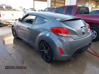 2013 Hyundai Veloster w/Black Int with VIN KMHTC6AD2DU158889, listed as a IAAI auction lot 41878065 with 157,450 mi miles and . Bid and sale history available at DreamBid. Image 3.