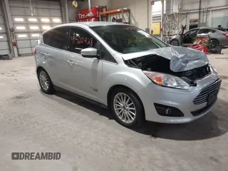 2016 Ford C-Max Energi SEL with VIN 1FADP5CU7GL113905, listed as a IAAI auction lot 41520928 with 147,008 mi miles. Bid and sale history available at carsss.com. Image 1.