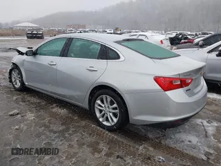 2018 Chevrolet Malibu LT z VIN 1G1ZD5STXJF269890, wystawiony jako IAAI lot #41504935 z przebiegiem 107 190 mil mil oraz . Historia ofert i sprzedaży dostępna na DreamBid. Obrazek 3.